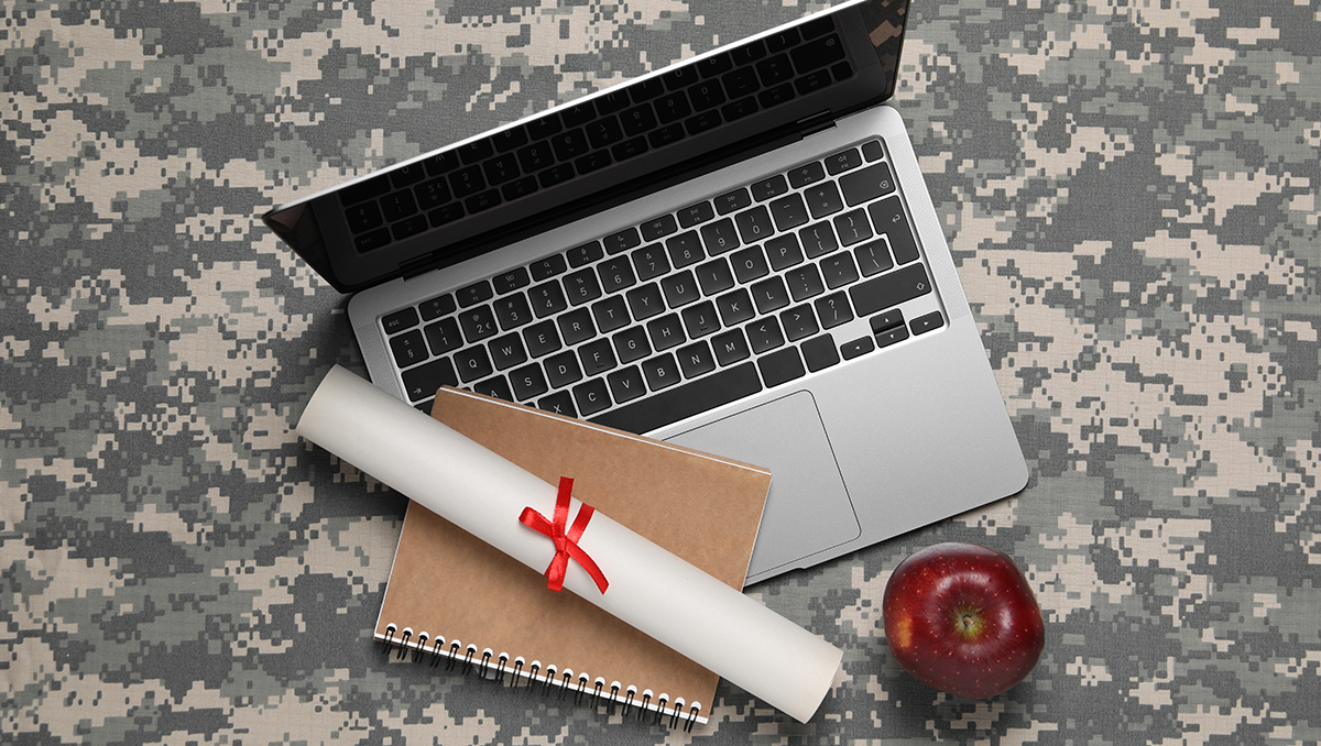 Notebook, diploma, laptop and apple on camouflage background, flat lay. Military education